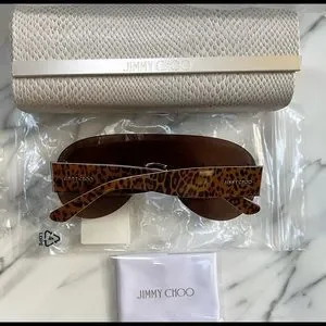 JIMMY CHOO UNISEX LEOPARD AND METAL SHIELD SUNGLASSES Explore a Jimmy Choo Black Pony-Fur Leopard Andie Round  main image 4